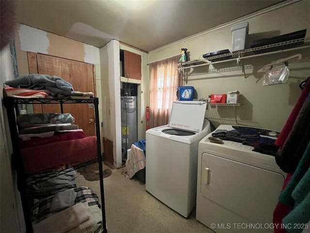 610 W Washington Ave, Krebs, OK 74501 - washroom with washing machine and clothes dryer, light colored carpet, and water heater