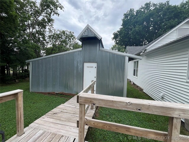 610 W Washington Ave, Krebs, OK 74501 - wooden deck with a lawn