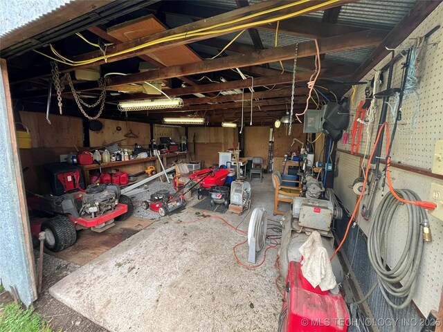 610 W Washington Ave, Krebs, OK 74501 - garage with a workshop area