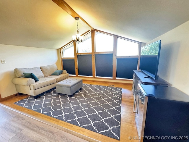 20413 E Allen Rd, Tahlequah, OK 74464 - living room with light wood-style floors and a chandelier