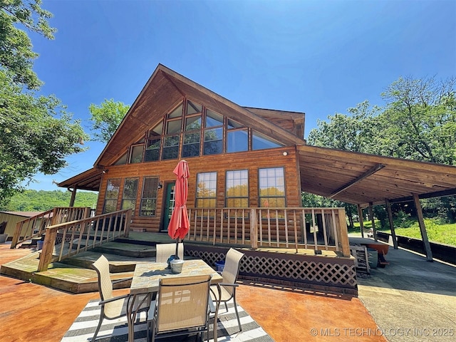 20413 E Allen Rd, Tahlequah, OK 74464 - deck with outdoor dining area and a patio