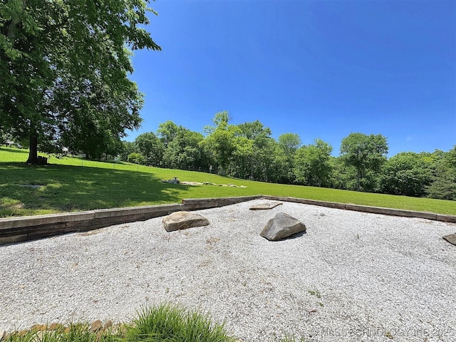 20413 E Allen Rd, Tahlequah, OK 74464 - view of home's community with a lawn