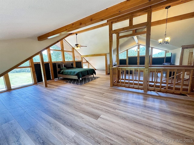 20413 E Allen Rd, Tahlequah, OK 74464 - bedroom with wood finished floors and a chandelier