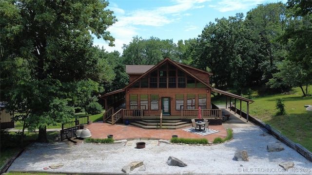 20413 E Allen Rd, Tahlequah, OK 74464 - view of front of house with covered porch and log veneer siding