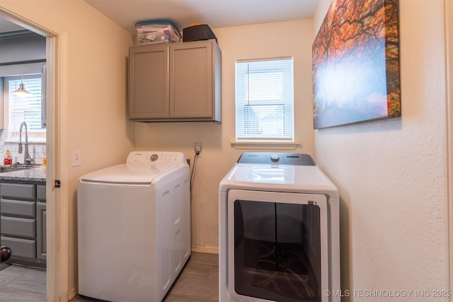 20903 E 35th St S, Broken Arrow, OK 74014 - washroom with independent washer and dryer and cabinet space