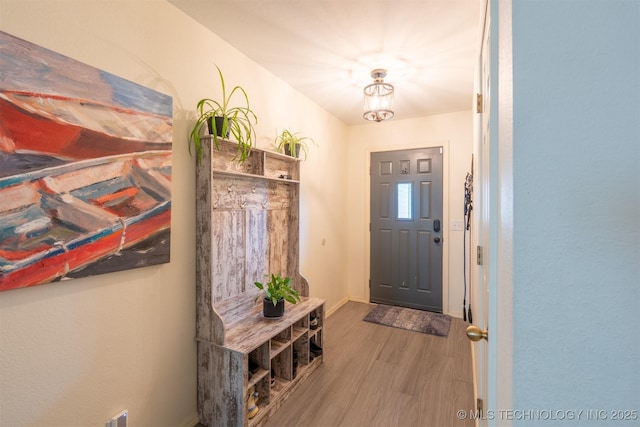 20903 E 35th St S, Broken Arrow, OK 74014 - entrance foyer featuring wood finished floors, baseboards, and a chandelier