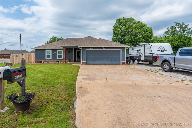 20903 E 35th St S, Broken Arrow, OK 74014 - ranch-style home featuring an attached garage, concrete driveway, a shingled roof, and brick siding