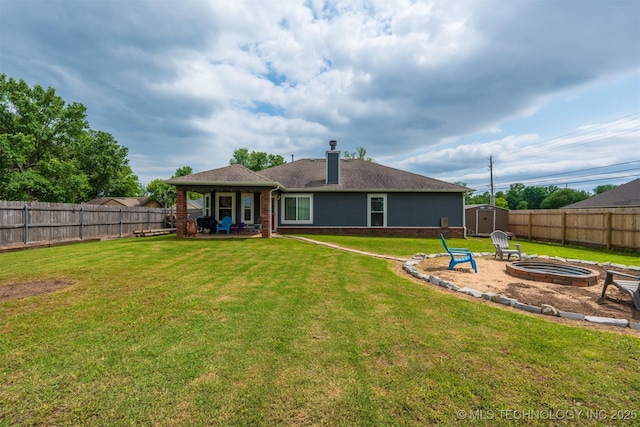 20903 E 35th St S, Broken Arrow, OK 74014 - back of property with a chimney, an outdoor fire pit, a patio area, brick siding, and a shingled roof