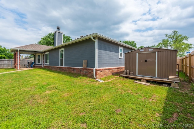 20903 E 35th St S, Broken Arrow, OK 74014 - back of property featuring a chimney, brick siding, and a patio area