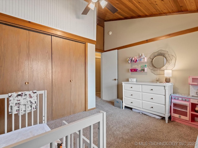 2310 Skyline Dr, Bartlesville, OK 74006 - bedroom featuring carpet flooring, wood ceiling, a closet, and ceiling fan