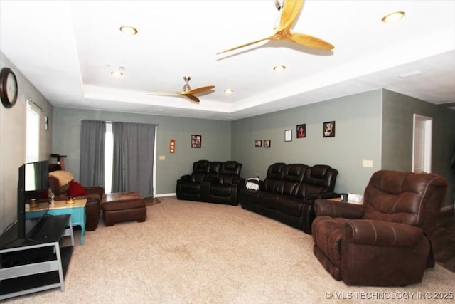410 Shawnee St, So Coffeyville, OK 74072 - living area with carpet floors, ceiling fan, recessed lighting, and a tray ceiling