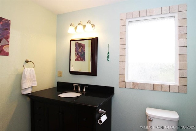 410 Shawnee St, So Coffeyville, OK 74072 - bathroom with vanity and toilet