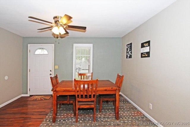410 Shawnee St, So Coffeyville, OK 74072 - dining space with ceiling fan, baseboards, and wood finished floors