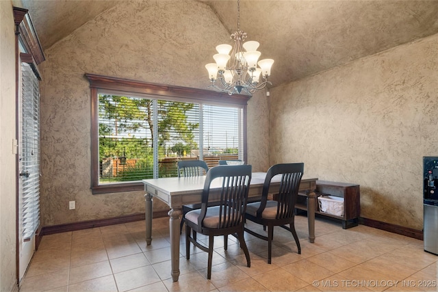 6601 E 85th St, Owasso, OK 74055 - dining area with healthy amount of natural light, vaulted ceiling, a chandelier, and light tile patterned floors