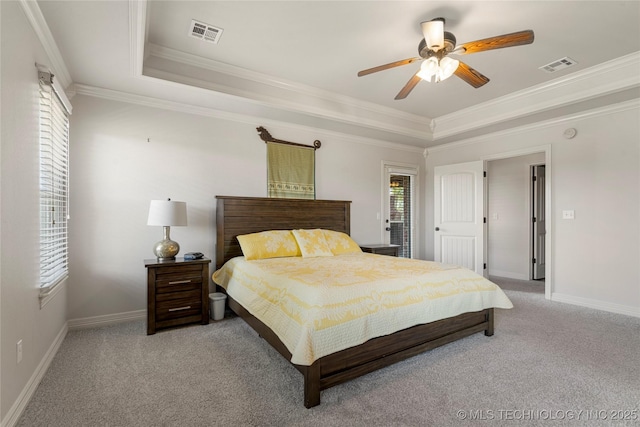 6601 E 85th St, Owasso, OK 74055 - bedroom featuring a tray ceiling, crown molding, light colored carpet, baseboards, and a ceiling fan