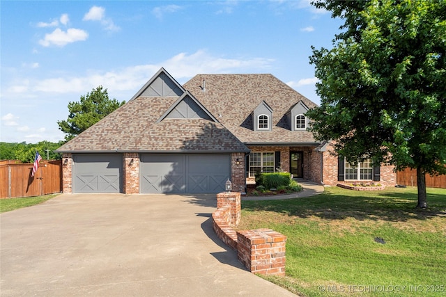 6601 E 85th St, Owasso, OK 74055 - view of front of home featuring concrete driveway, brick siding, a garage, and roof with shingles