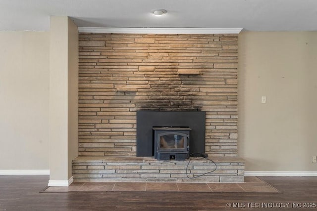 9012 S 49th W Ave, Tulsa, OK 74131 - detailed view of wood finished floors and a wood stove