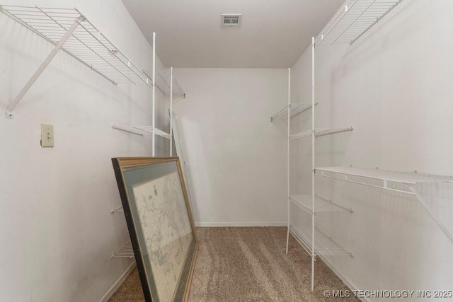 9012 S 49th W Ave, Tulsa, OK 74131 - spacious closet featuring carpet flooring