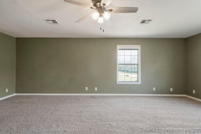 9012 S 49th W Ave, Tulsa, OK 74131 - carpeted spare room featuring baseboards and a ceiling fan