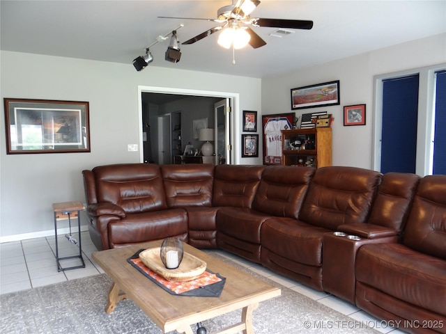 1105 Ono Ct, Mcalester, OK 74501 - living area featuring ceiling fan and light tile patterned floors