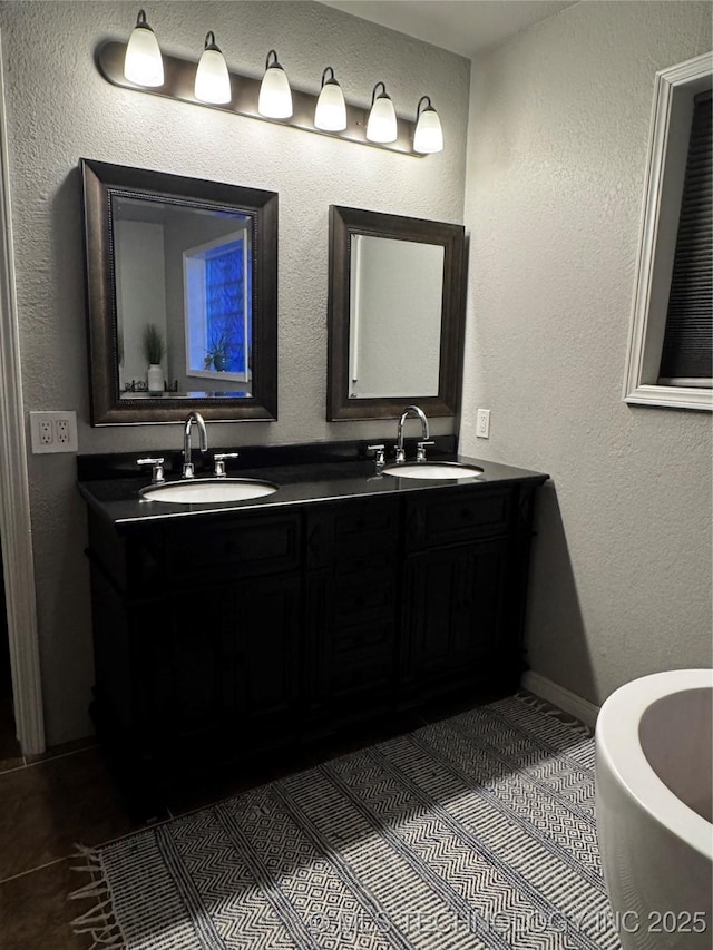 1105 Ono Ct, Mcalester, OK 74501 - full bathroom with double vanity, tile patterned flooring, and a soaking tub