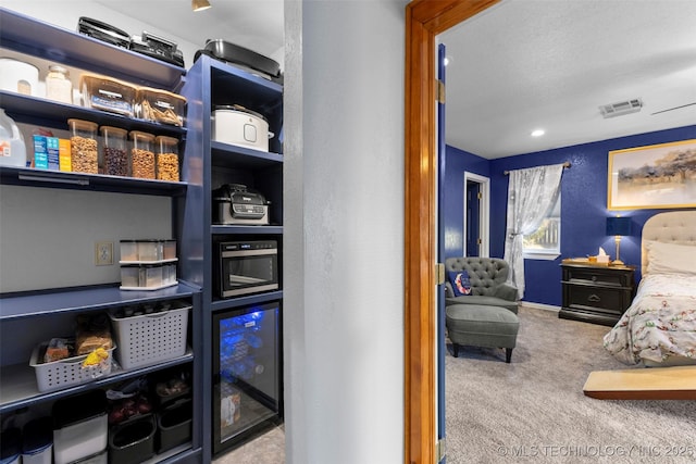 722 E 18th St, Ada, OK 74820 - pantry with wine cooler