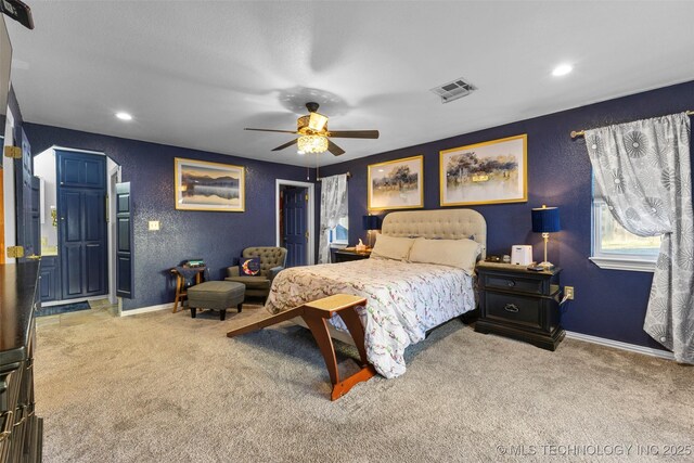 722 E 18th St, Ada, OK 74820 - carpeted bedroom with a textured wall, baseboards, a ceiling fan, and recessed lighting
