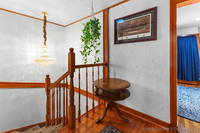 722 E 18th St, Ada, OK 74820 - stairway with wood finished floors and baseboards