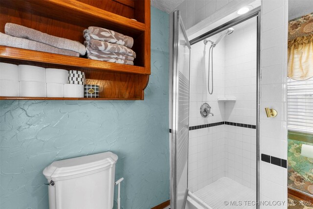 722 E 18th St, Ada, OK 74820 - full bath with a stall shower and toilet