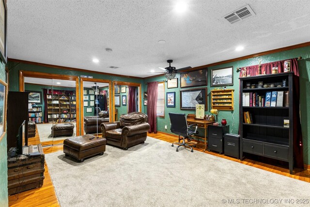 722 E 18th St, Ada, OK 74820 - office area featuring crown molding, wood finished floors, a ceiling fan, a textured ceiling, and recessed lighting