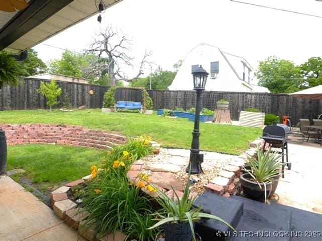 722 E 18th St, Ada, OK 74820 - view of yard featuring a patio area