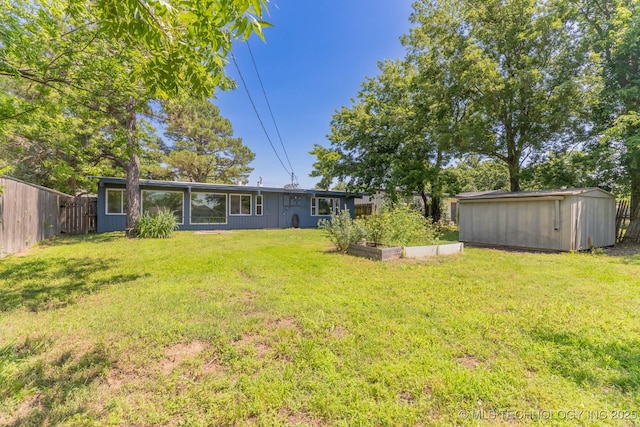 5726 E 26th St, Tulsa, OK 74114 - view of yard featuring a garden