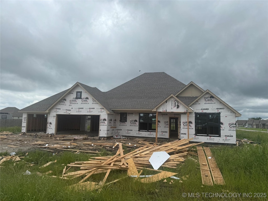 7018 E 143rd St, Collinsville, OK 74021 - view of front of home with roof with shingles