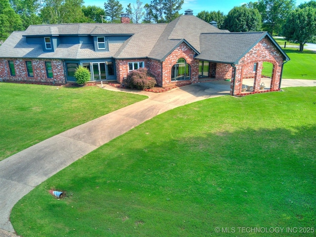 23240 E 90th St S, Broken Arrow, OK 74014 - view of front facade with brick siding, driveway, a chimney, a front yard, and roof with shingles