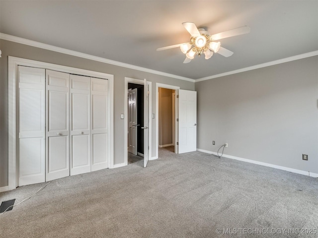 23240 E 90th St S, Broken Arrow, OK 74014 - unfurnished bedroom with crown molding, baseboards, carpet floors, a closet, and ceiling fan