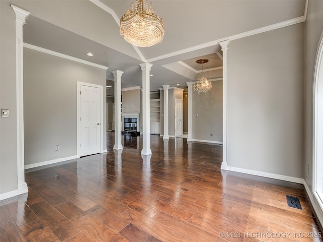 23240 E 90th St S, Broken Arrow, OK 74014 - unfurnished living room with a chandelier, ornate columns, baseboards, wood finished floors, and ornamental molding