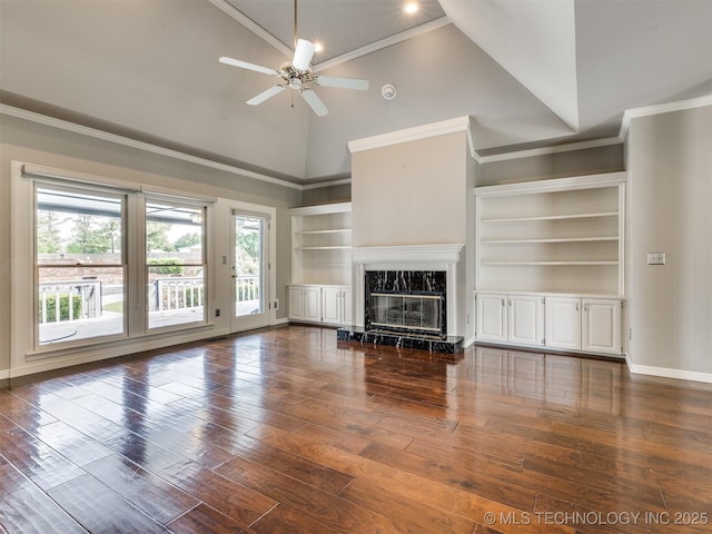 23240 E 90th St S, Broken Arrow, OK 74014 - unfurnished living room featuring dark wood-style flooring, high vaulted ceiling, ceiling fan, a high end fireplace, and baseboards