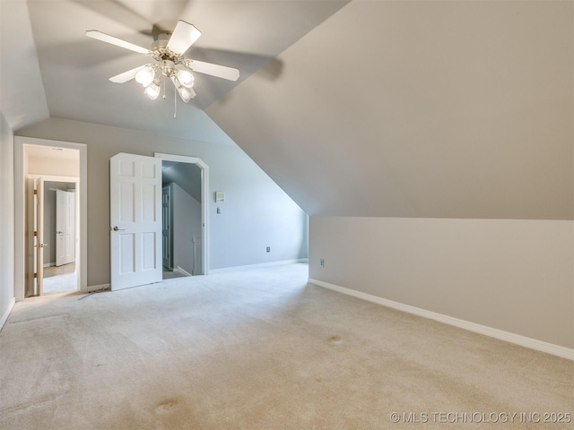 23240 E 90th St S, Broken Arrow, OK 74014 - bonus room with vaulted ceiling, carpet flooring, a ceiling fan, and baseboards