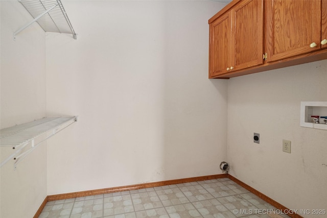 15 W Ridge Way, Bristow, OK 74010 - washroom featuring hookup for a washing machine, cabinet space, hookup for an electric dryer, light floors, and baseboards