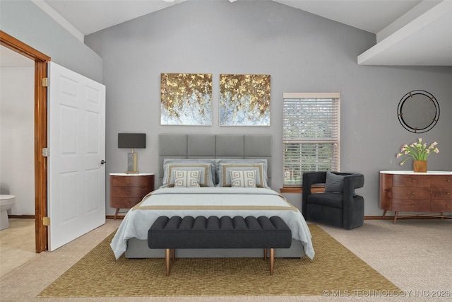 15 W Ridge Way, Bristow, OK 74010 - carpeted bedroom featuring high vaulted ceiling and ensuite bath