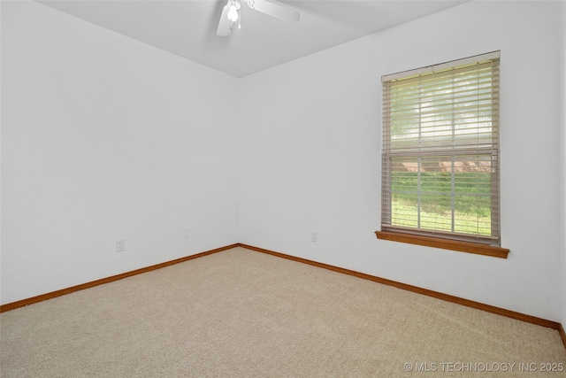 15 W Ridge Way, Bristow, OK 74010 - carpeted empty room featuring baseboards and ceiling fan