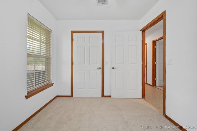 15 W Ridge Way, Bristow, OK 74010 - unfurnished bedroom featuring light carpet and baseboards