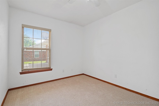 15 W Ridge Way, Bristow, OK 74010 - unfurnished room with carpet flooring, baseboards, and a ceiling fan
