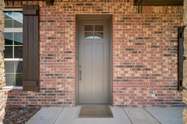 9015 N 65th E Pl, Owasso, OK 74055 - entrance to property with brick siding