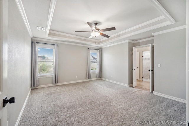 9015 N 65th E Pl, Owasso, OK 74055 - unfurnished bedroom with a raised ceiling, ornamental molding, carpet, baseboards, and ceiling fan