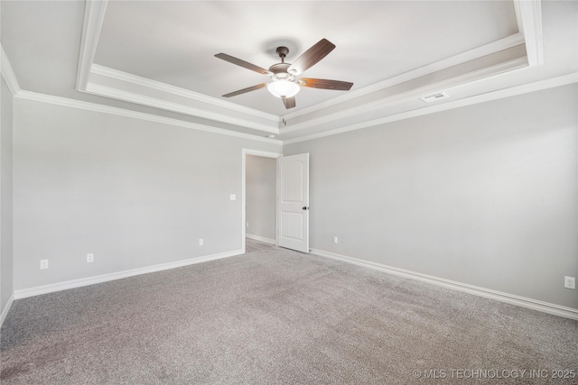 9015 N 65th E Pl, Owasso, OK 74055 - unfurnished room with a tray ceiling, ceiling fan, crown molding, carpet flooring, and baseboards