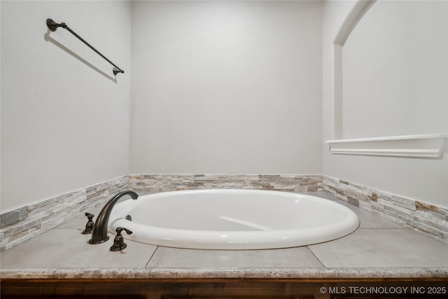 9015 N 65th E Pl, Owasso, OK 74055 - bathroom with a garden tub