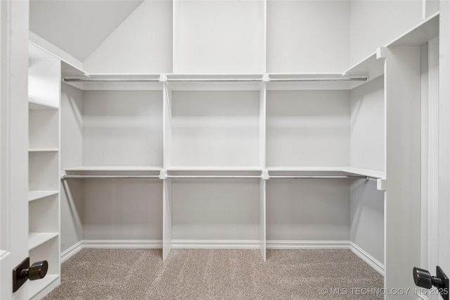 9015 N 65th E Pl, Owasso, OK 74055 - walk in closet with carpet floors