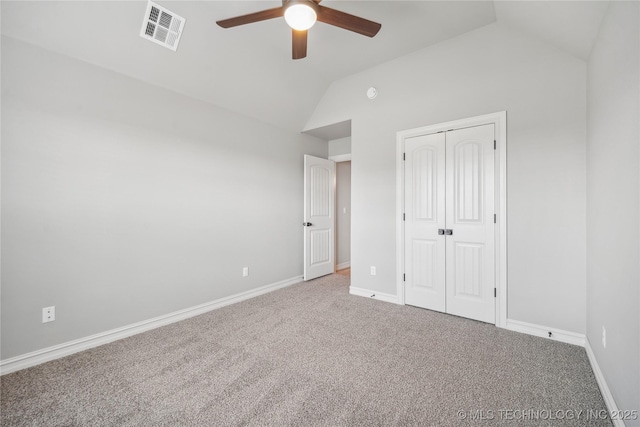 9015 N 65th E Pl, Owasso, OK 74055 - unfurnished bedroom with lofted ceiling, carpet flooring, baseboards, a closet, and a ceiling fan
