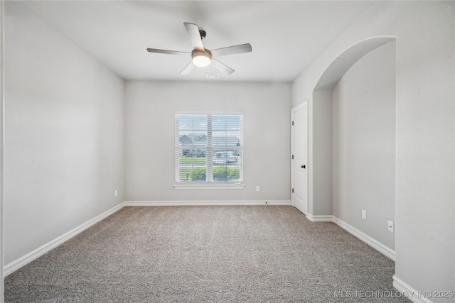 9015 N 65th E Pl, Owasso, OK 74055 - spare room with carpet, ceiling fan, and baseboards
